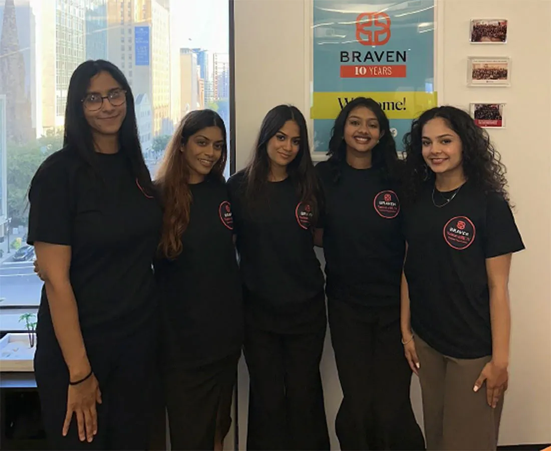 Members posing as a group at an event