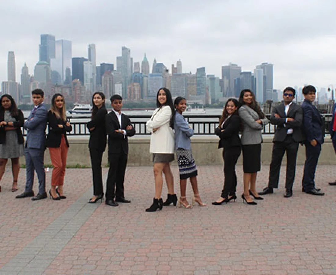 group picture of delta sigma members in front of NYC skyline
