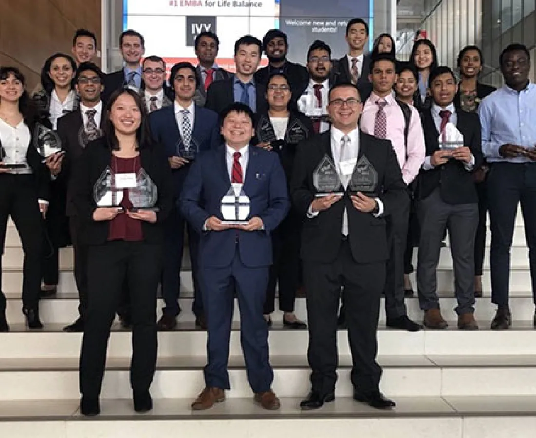 Members posing as a group at an event