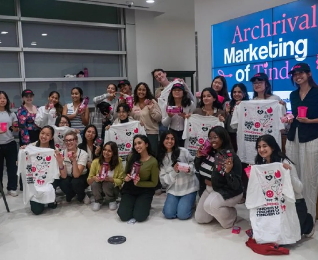Members posing as a group at an event