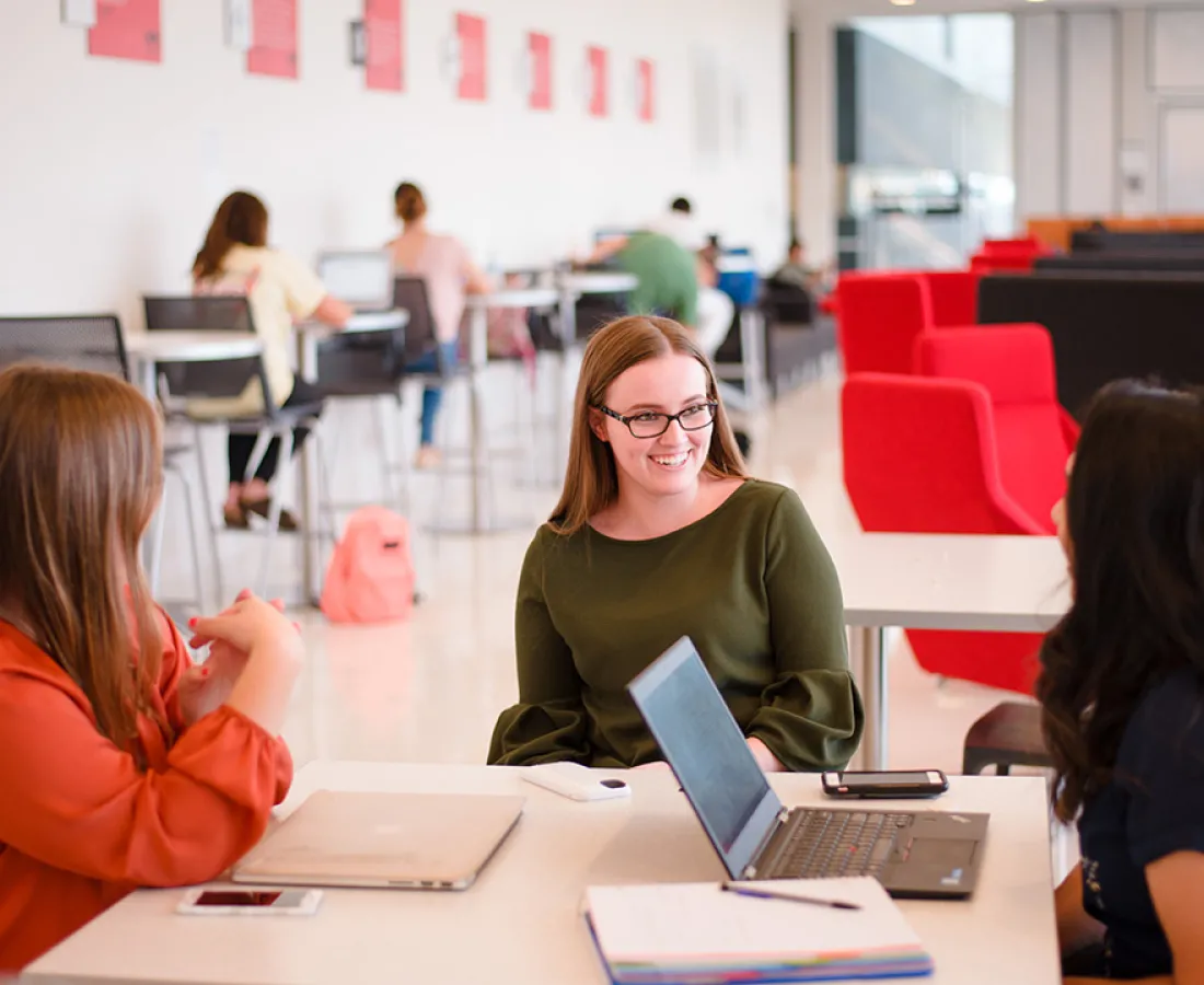 Students studying together in common lounge space