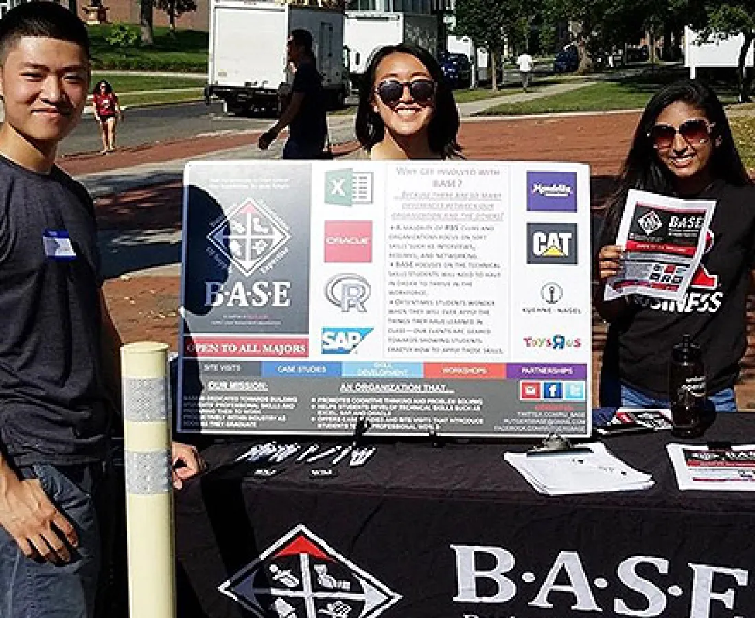 Three members tabling at the involvement fair