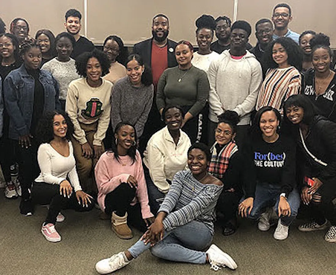 BBA members pose together in a classroom