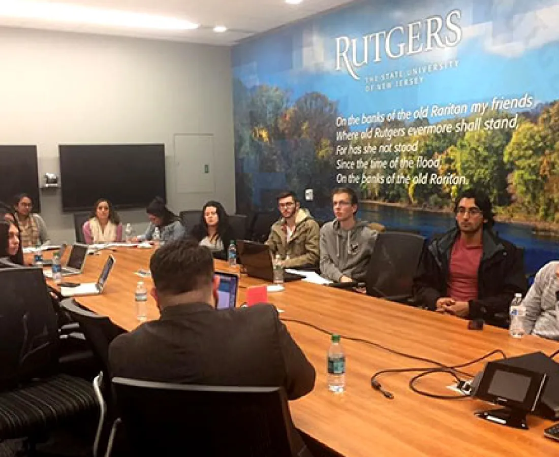 RAMS members sitting in a boardroom