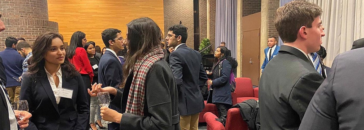 Members of PBL mingling at an organization event