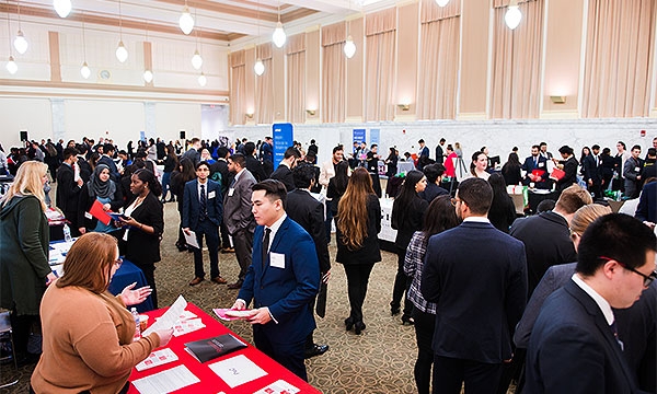 A large gathering of people at the Career Fair