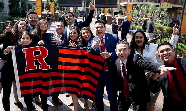 ALPFA members pose with a Rutgers flag