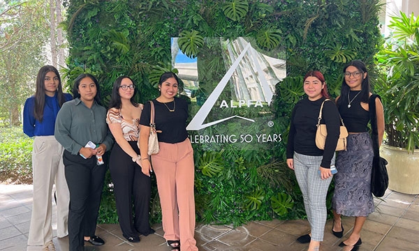 ALPFA members pose as a group