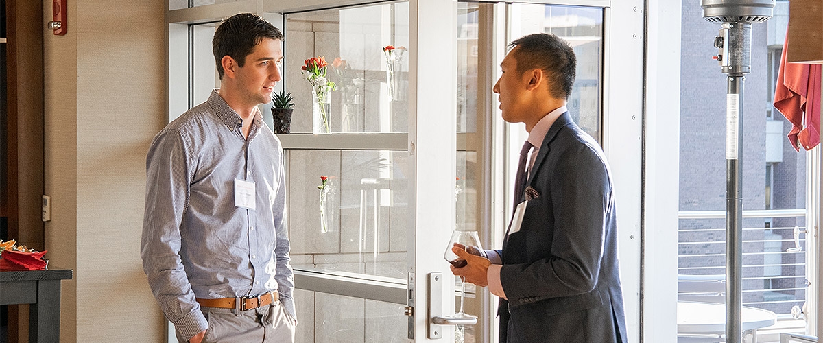 A student chats with his mentor at RBS
