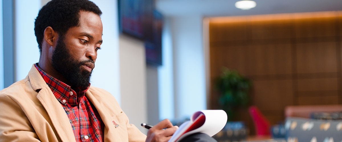 Rutgers Business School student studying.