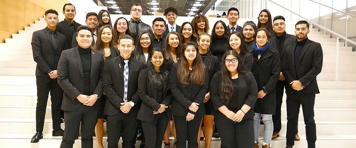 Students of ALPFA on the steps inside 100 Rock