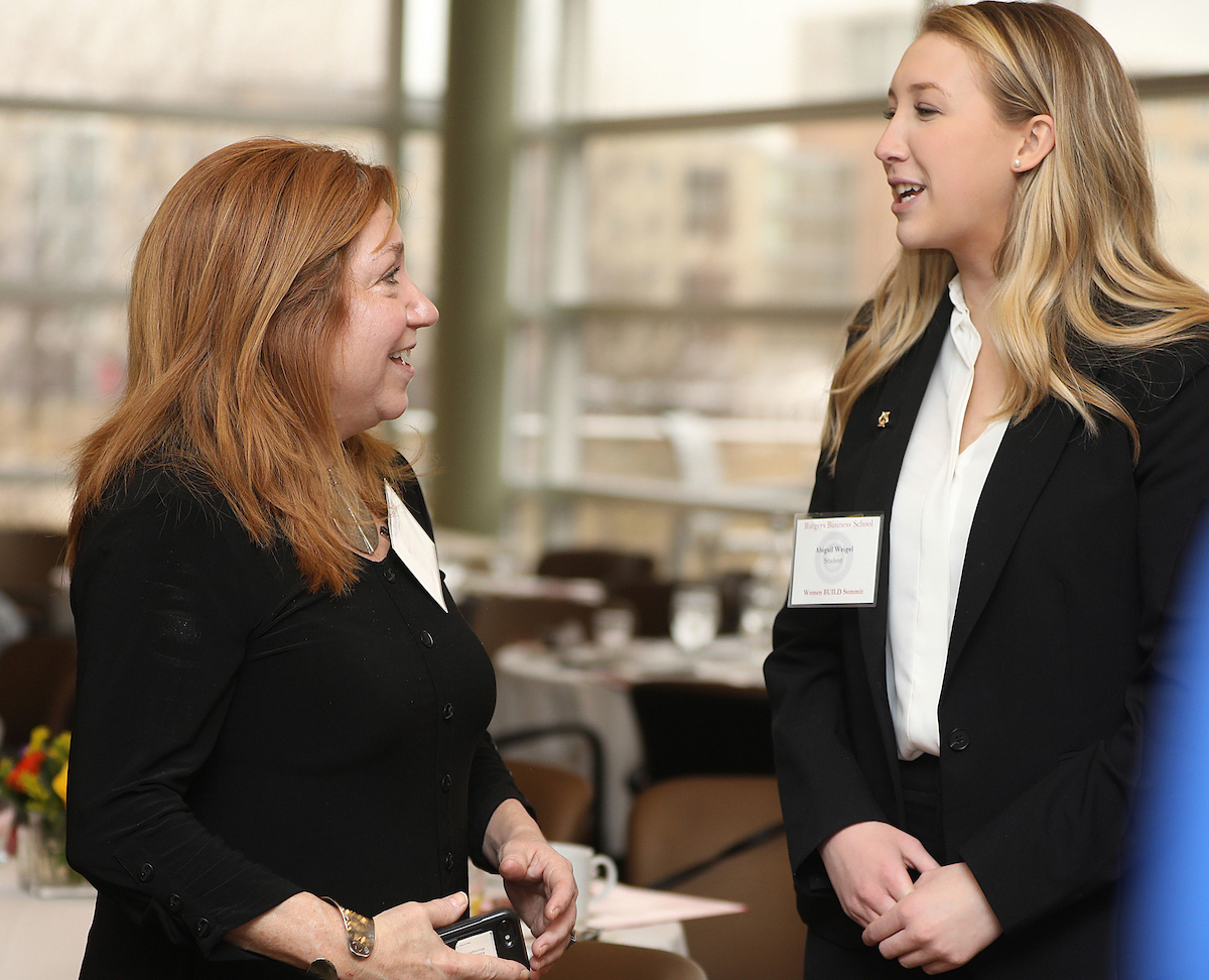 student speaking with mentor